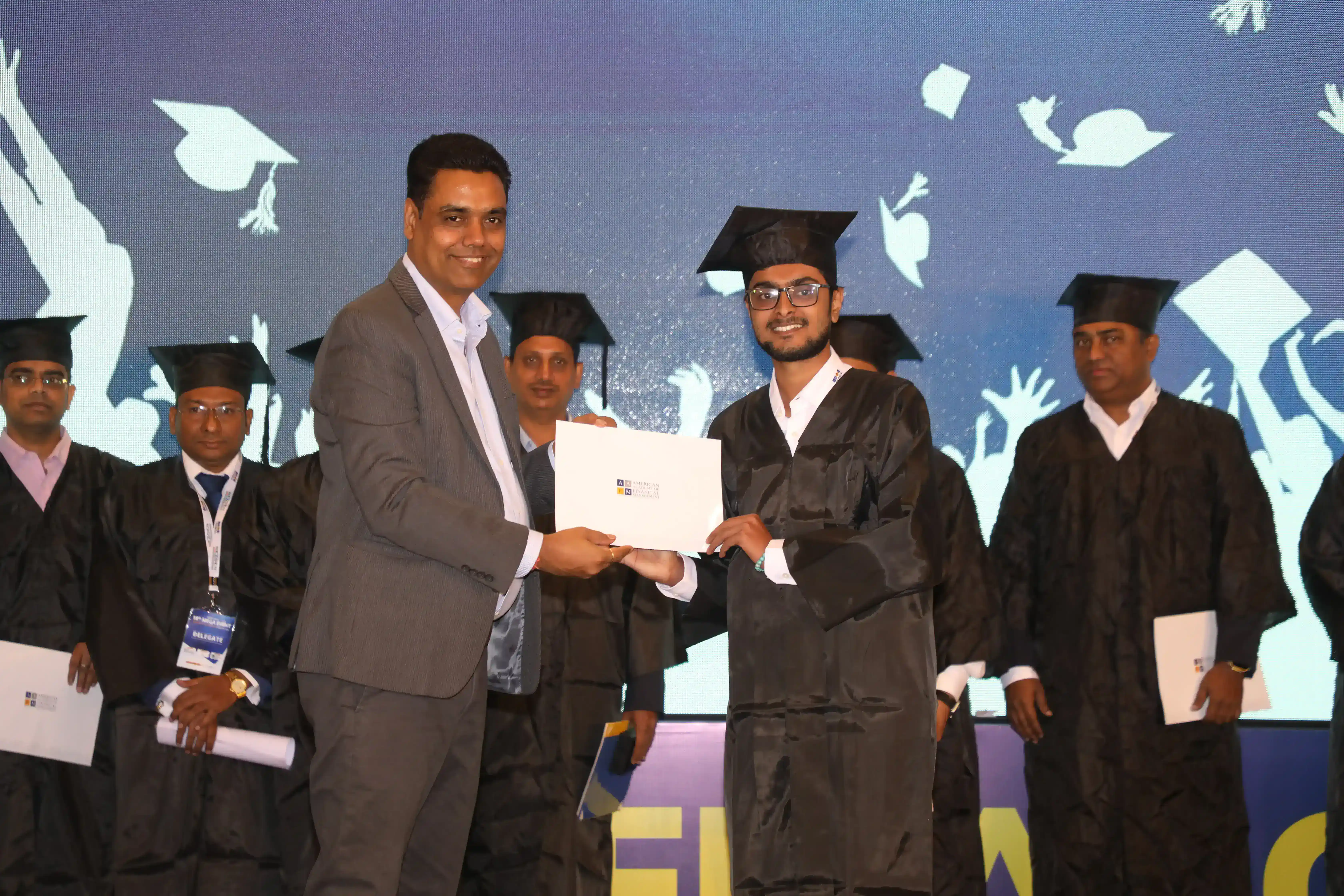 AAFM India convocation &mdash; graduates receiving their certificates on stage